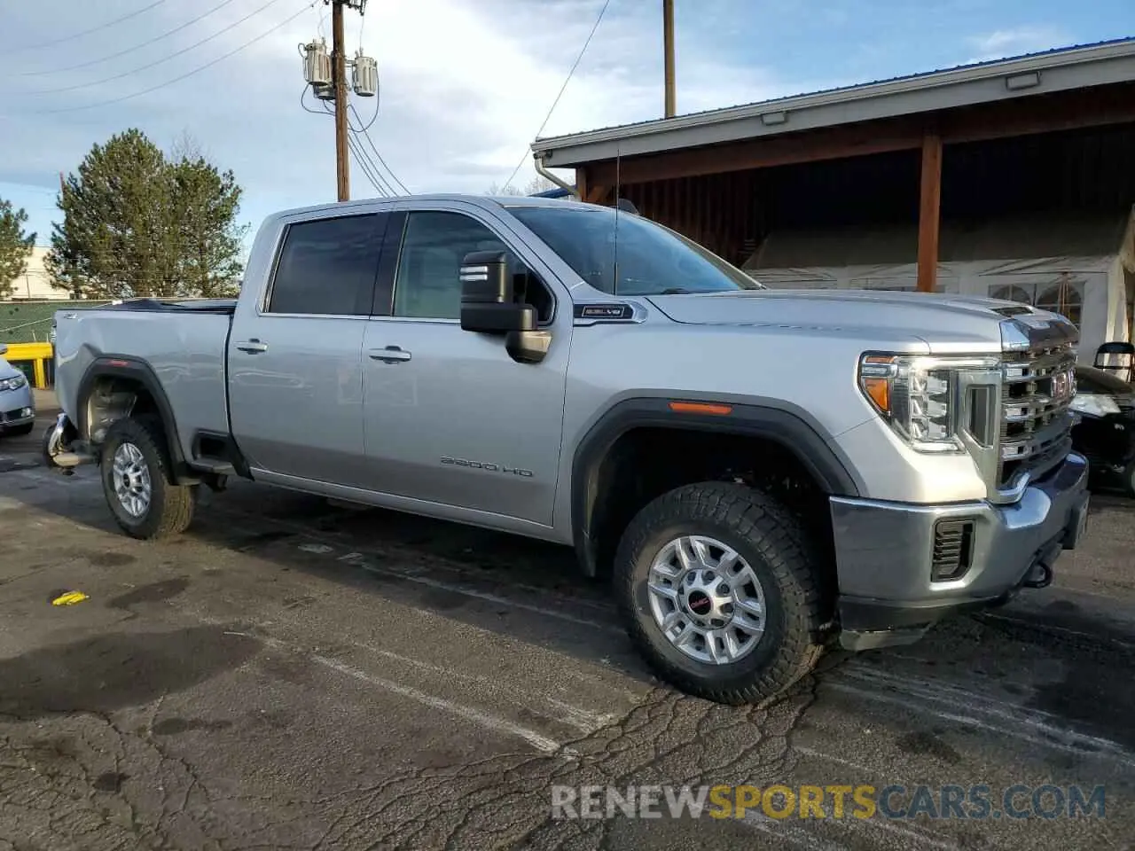 4 Photograph of a damaged car 1GT19ME74NF256346 GMC SIERRA 2022