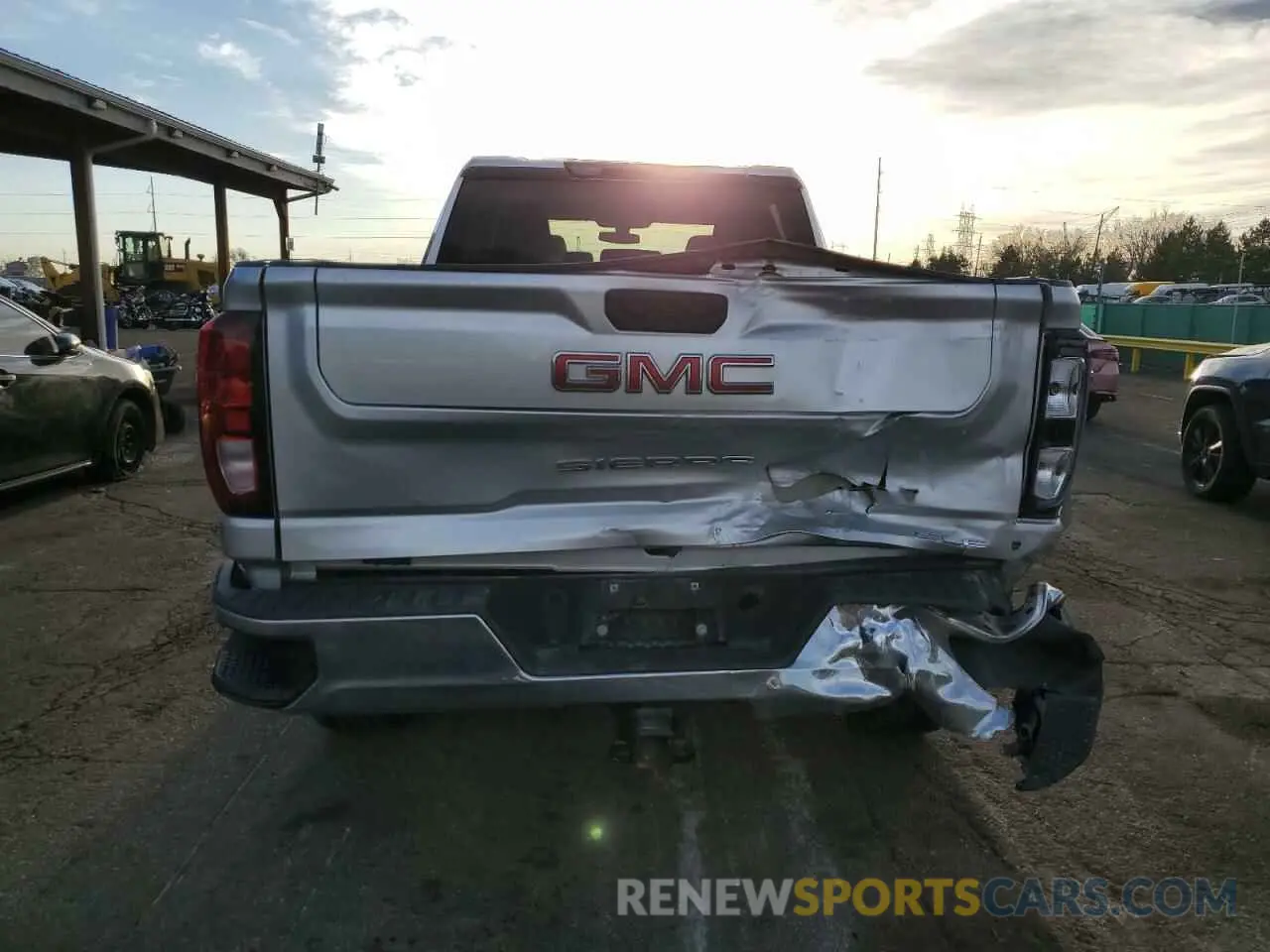 6 Photograph of a damaged car 1GT19ME74NF256346 GMC SIERRA 2022