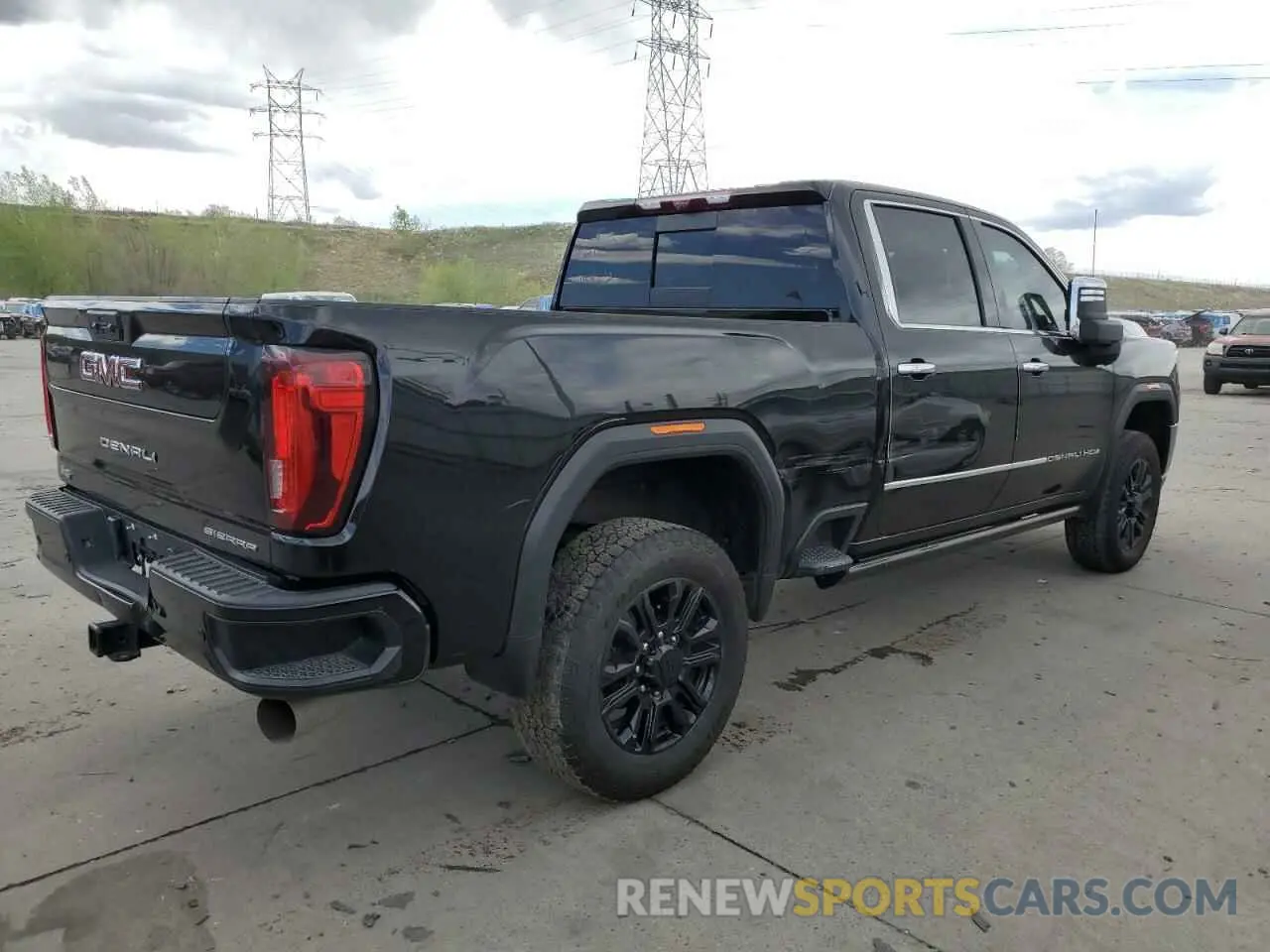 3 Photograph of a damaged car 1GT49REY0NF122680 GMC SIERRA 2022