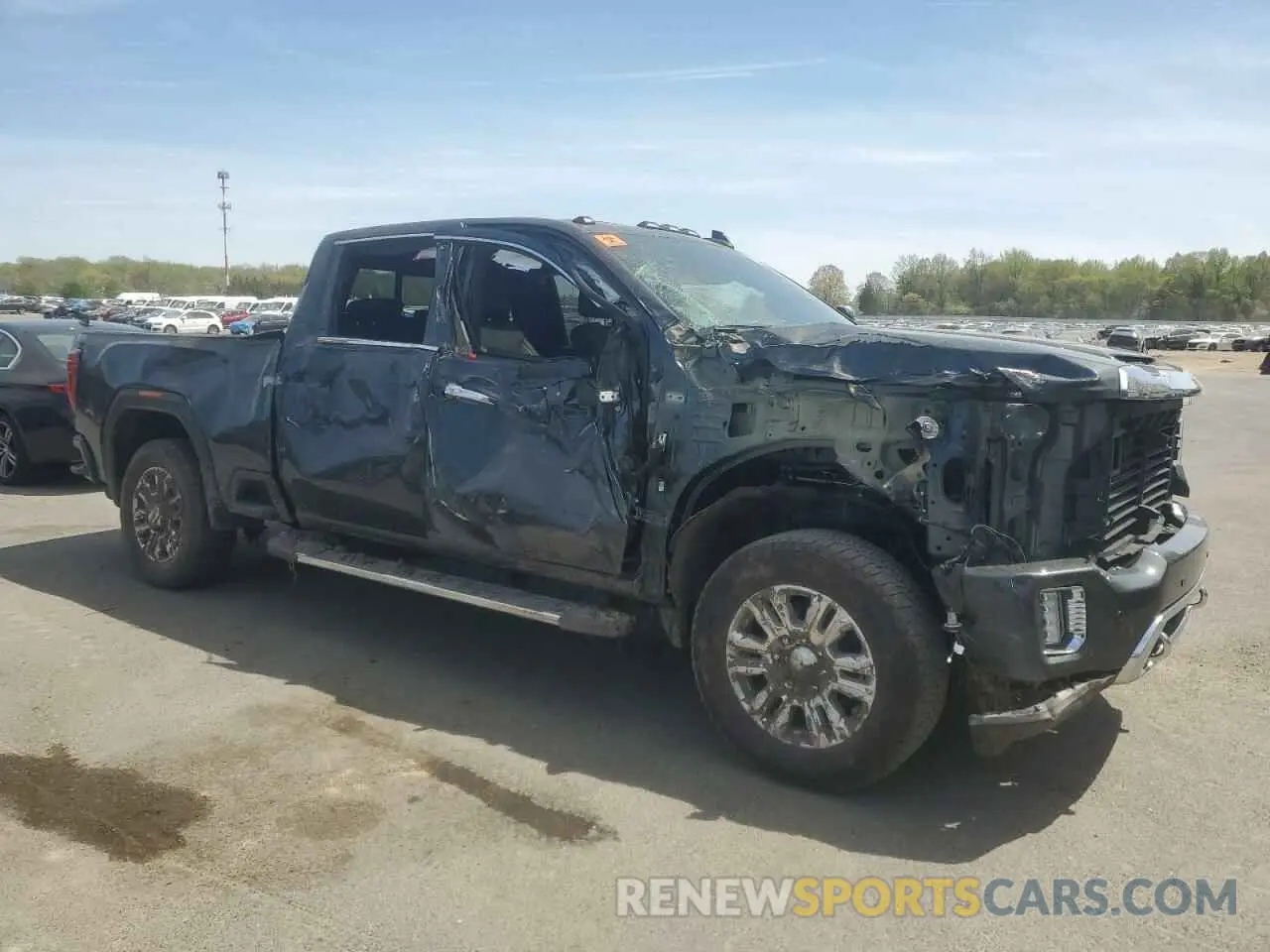4 Photograph of a damaged car 1GT49REY0NF180840 GMC SIERRA 2022