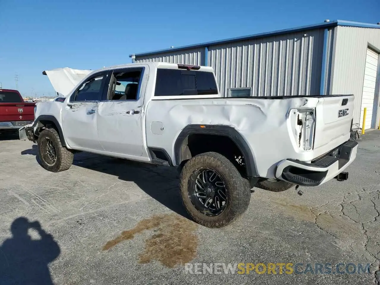 2 Photograph of a damaged car 1GT49REY0NF289329 GMC SIERRA 2022