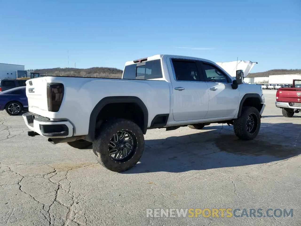 3 Photograph of a damaged car 1GT49REY0NF289329 GMC SIERRA 2022