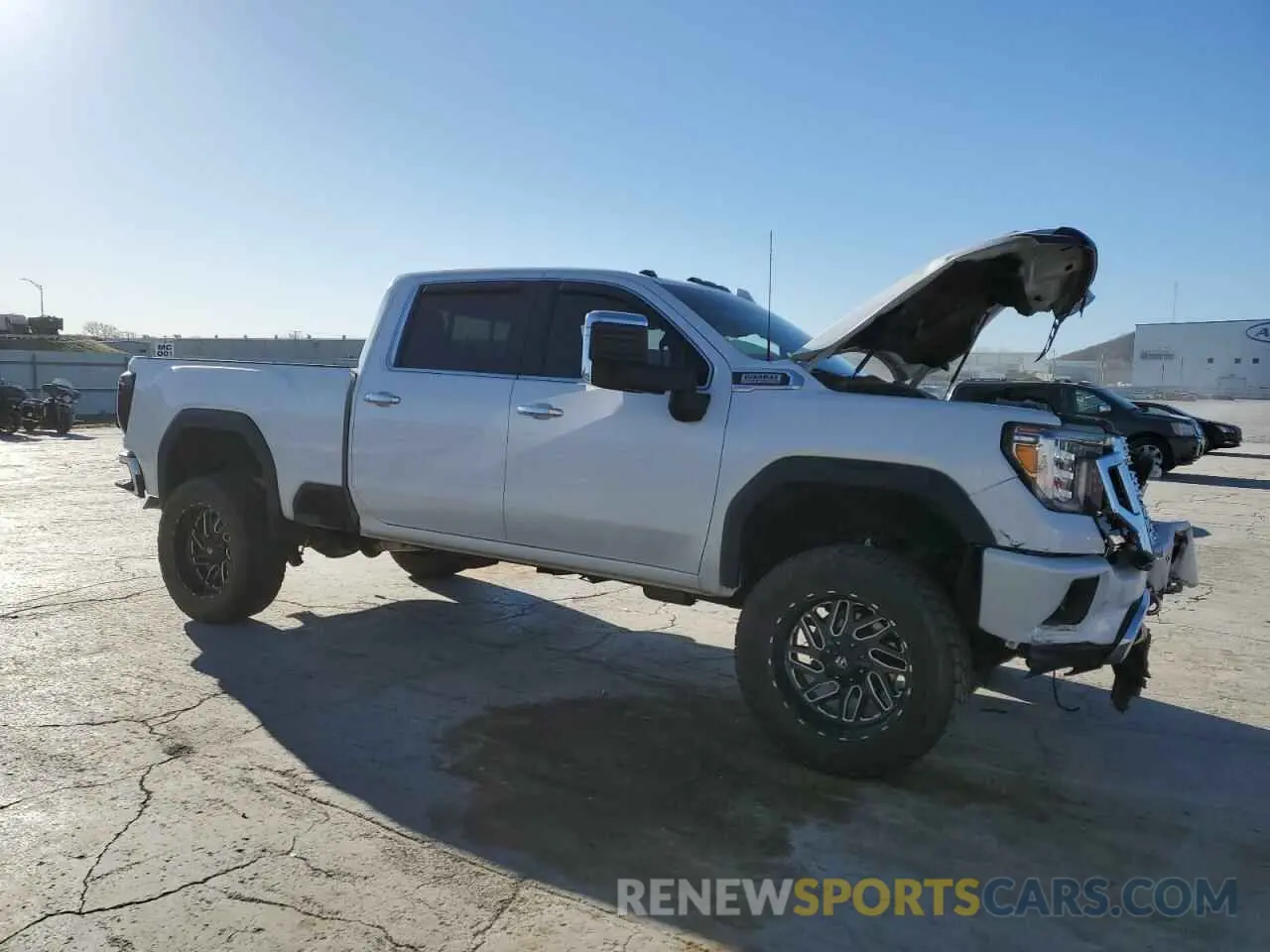 4 Photograph of a damaged car 1GT49REY0NF289329 GMC SIERRA 2022