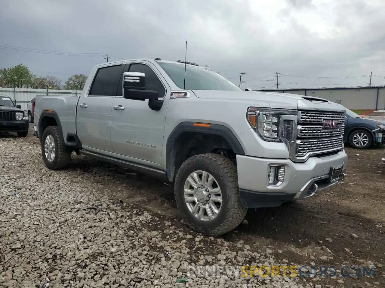 4 Photograph of a damaged car 1GT49REY8NF364231 GMC SIERRA 2022