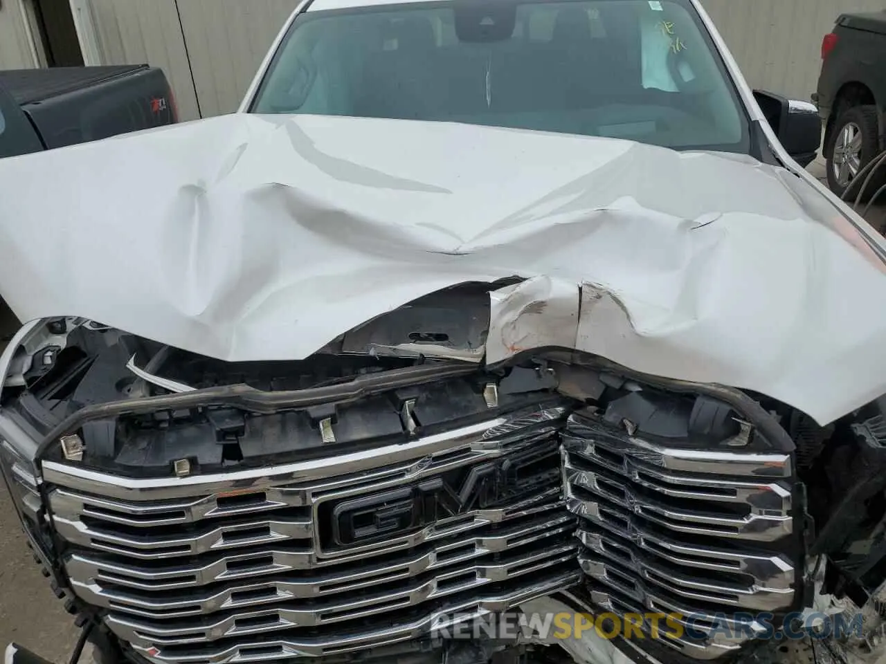 11 Photograph of a damaged car 1GTUUGEL6NZ540053 GMC SIERRA 2022