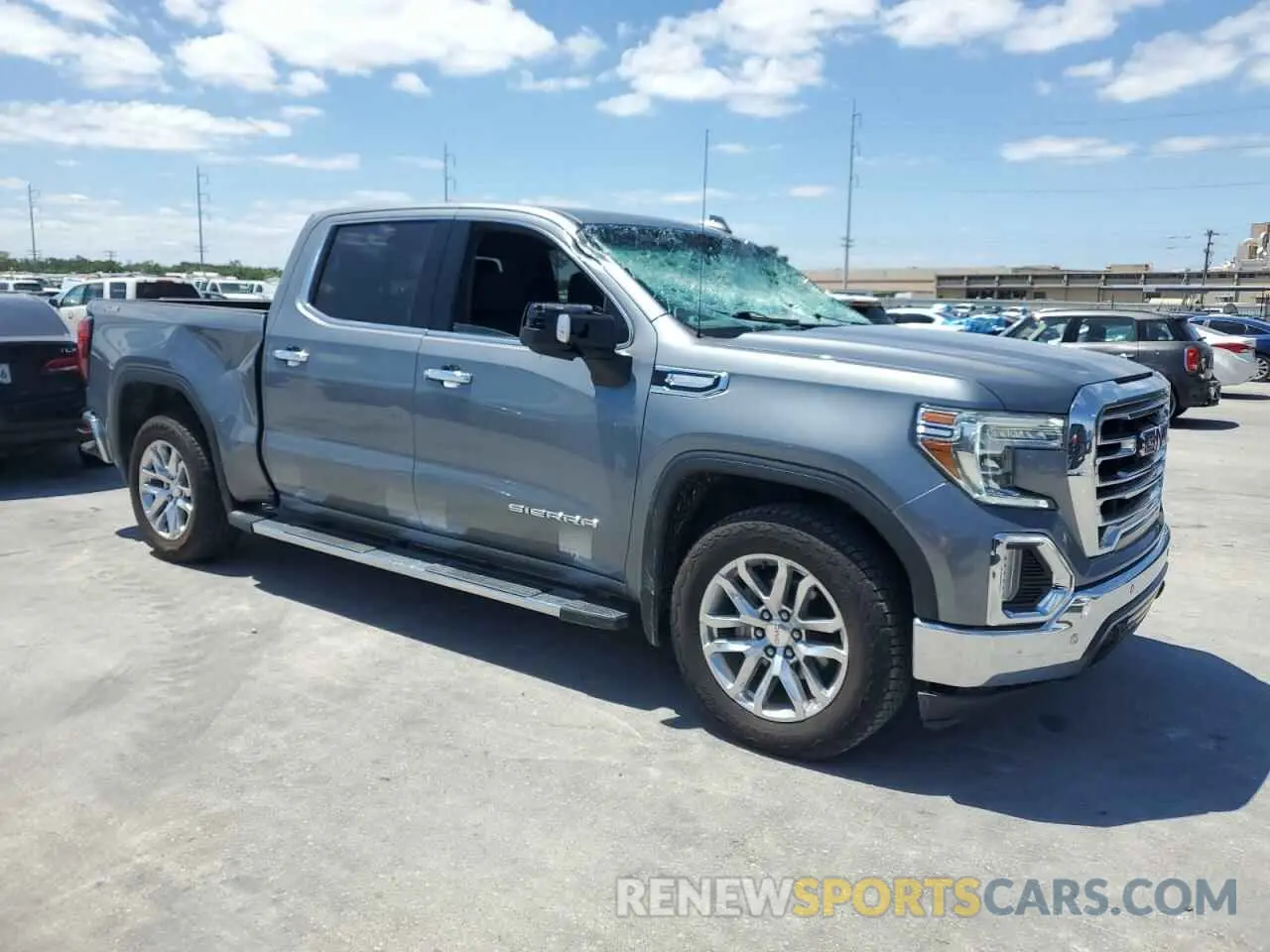 4 Photograph of a damaged car 3GTU9DED0NG104761 GMC SIERRA 2022
