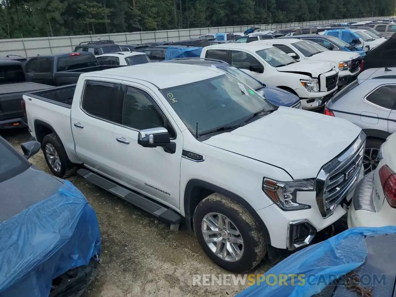 4 Photograph of a damaged car 3GTU9DED6NG158615 GMC SIERRA 2022