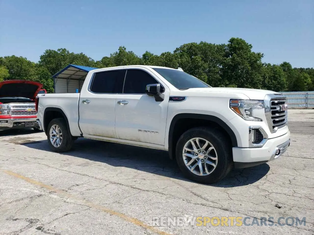 4 Photograph of a damaged car 3GTU9DEL9NG207118 GMC SIERRA 2022