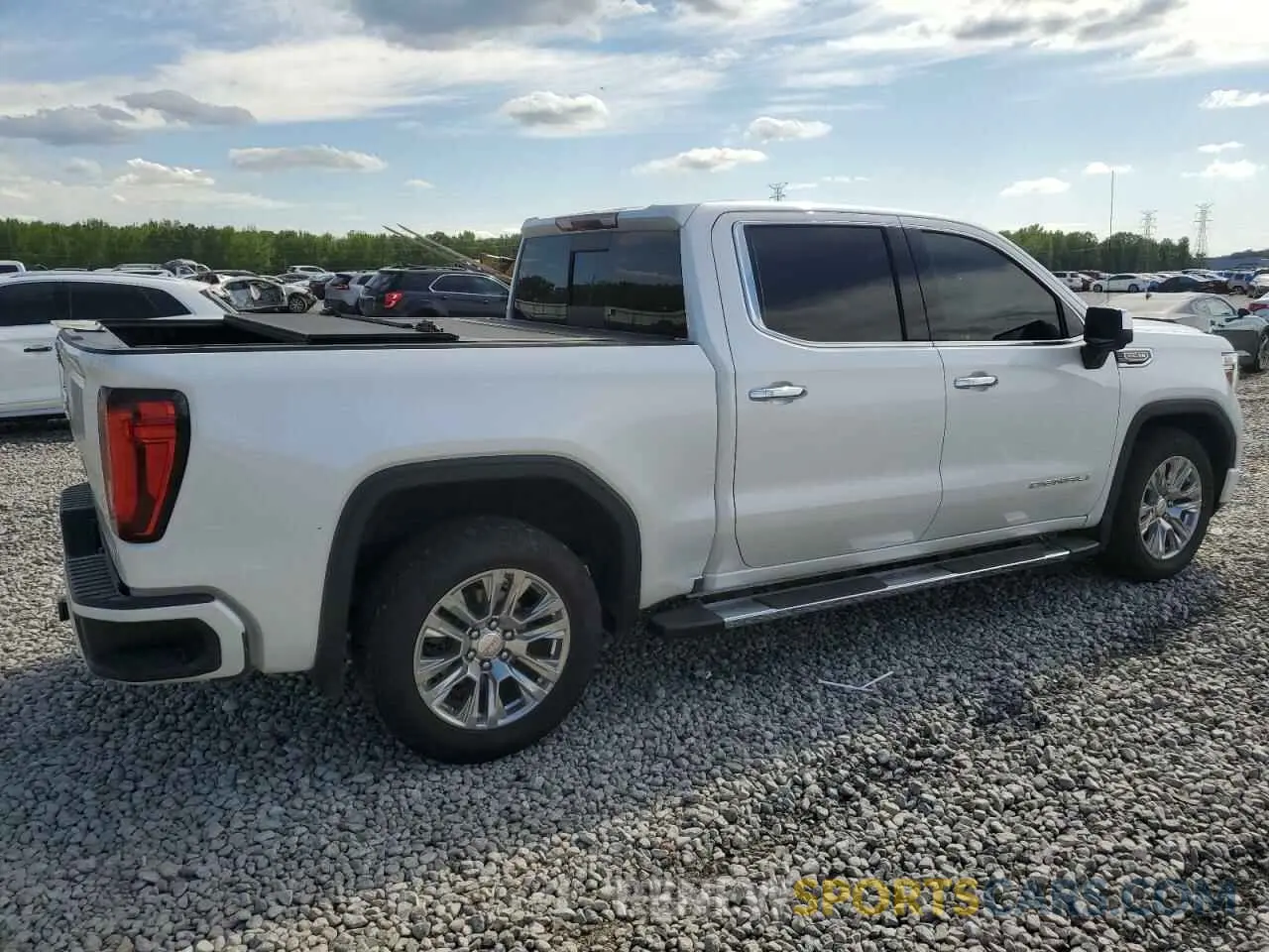 3 Photograph of a damaged car 3GTU9FEL9NG158840 GMC SIERRA 2022