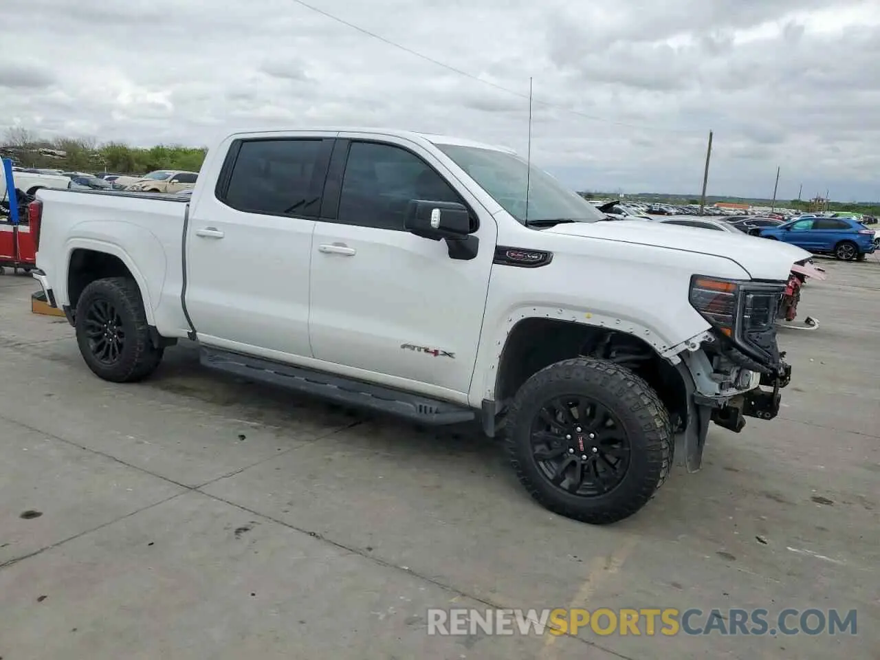4 Photograph of a damaged car 3GTUUFEL4NG662159 GMC SIERRA 2022
