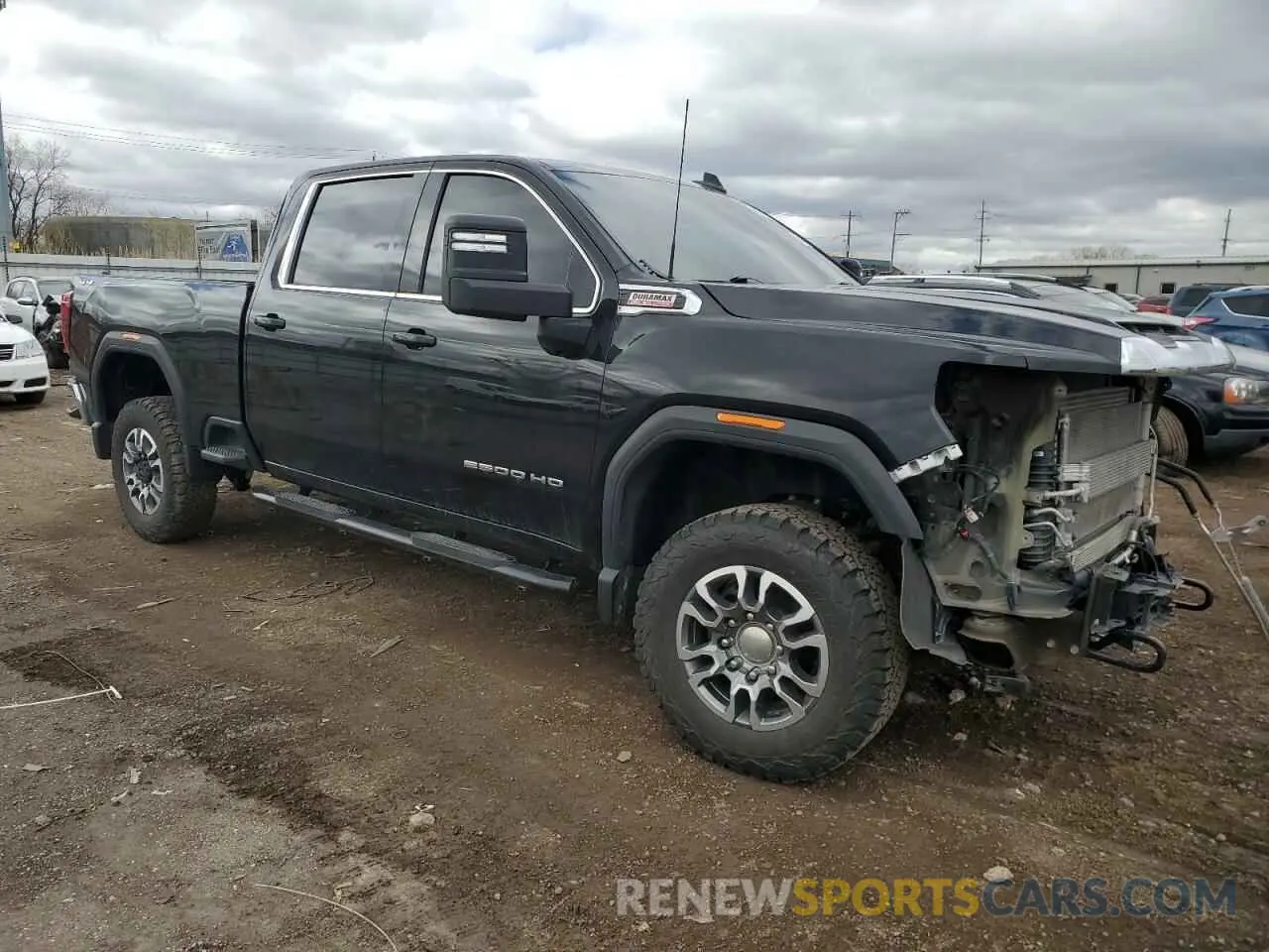 4 Photograph of a damaged car 1GT19MEY2PF133530 GMC SIERRA 2023