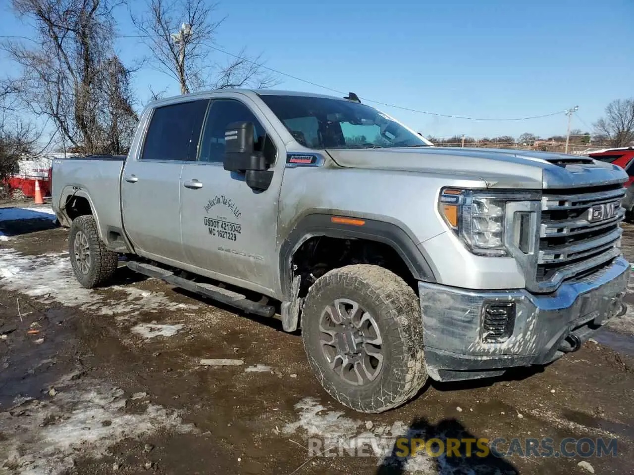 4 Photograph of a damaged car 1GT19MEY8PF207663 GMC SIERRA 2023