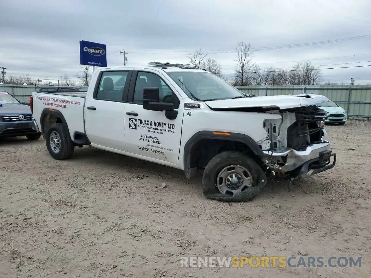 4 Photograph of a damaged car 1GT49LE75PF212494 GMC SIERRA 2023