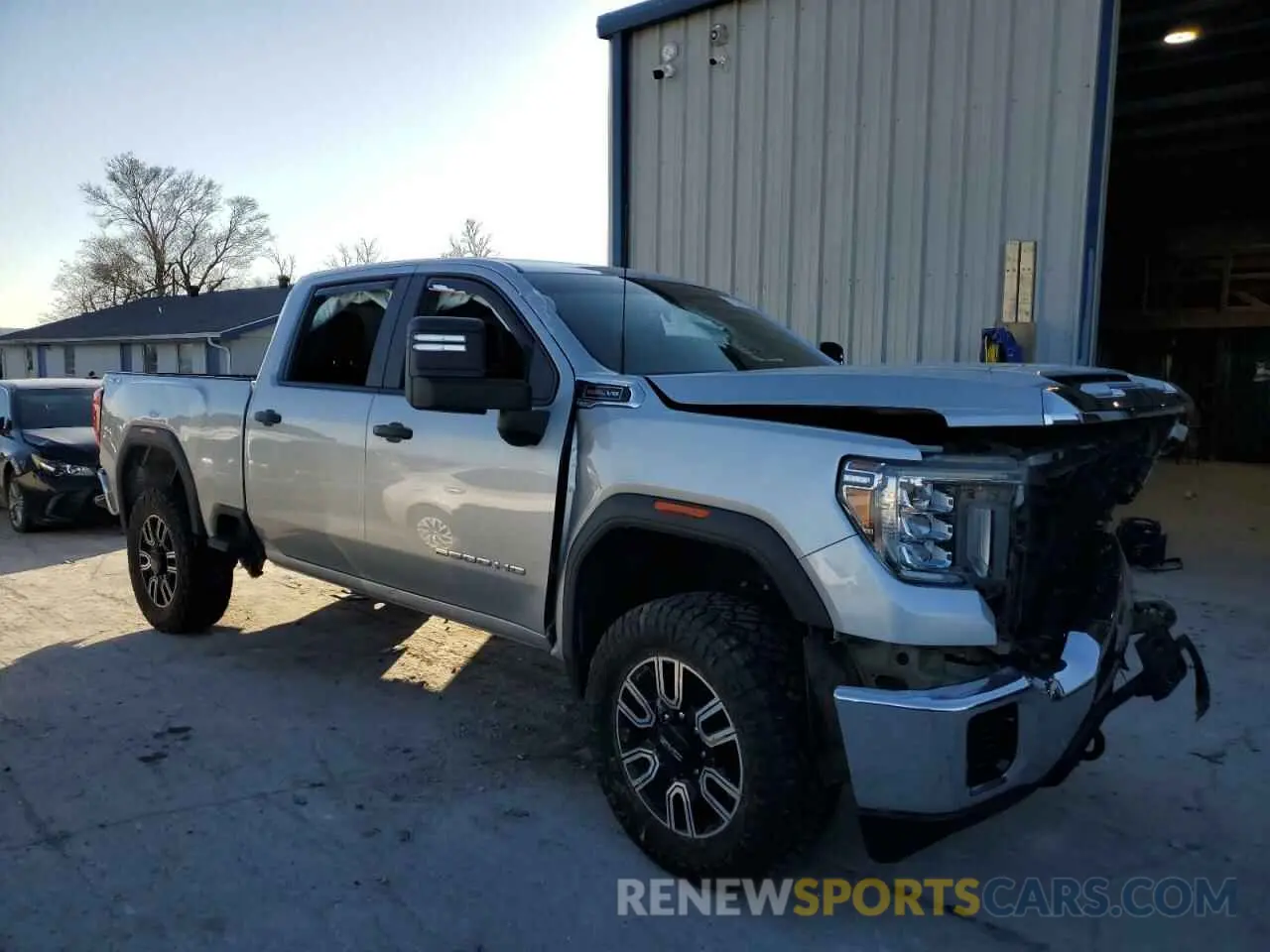 4 Photograph of a damaged car 1GT49LE76PF174578 GMC SIERRA 2023