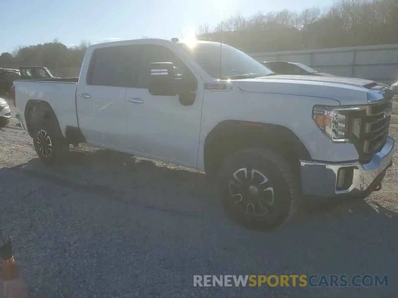 4 Photograph of a damaged car 1GT49LEY9PF206237 GMC SIERRA 2023