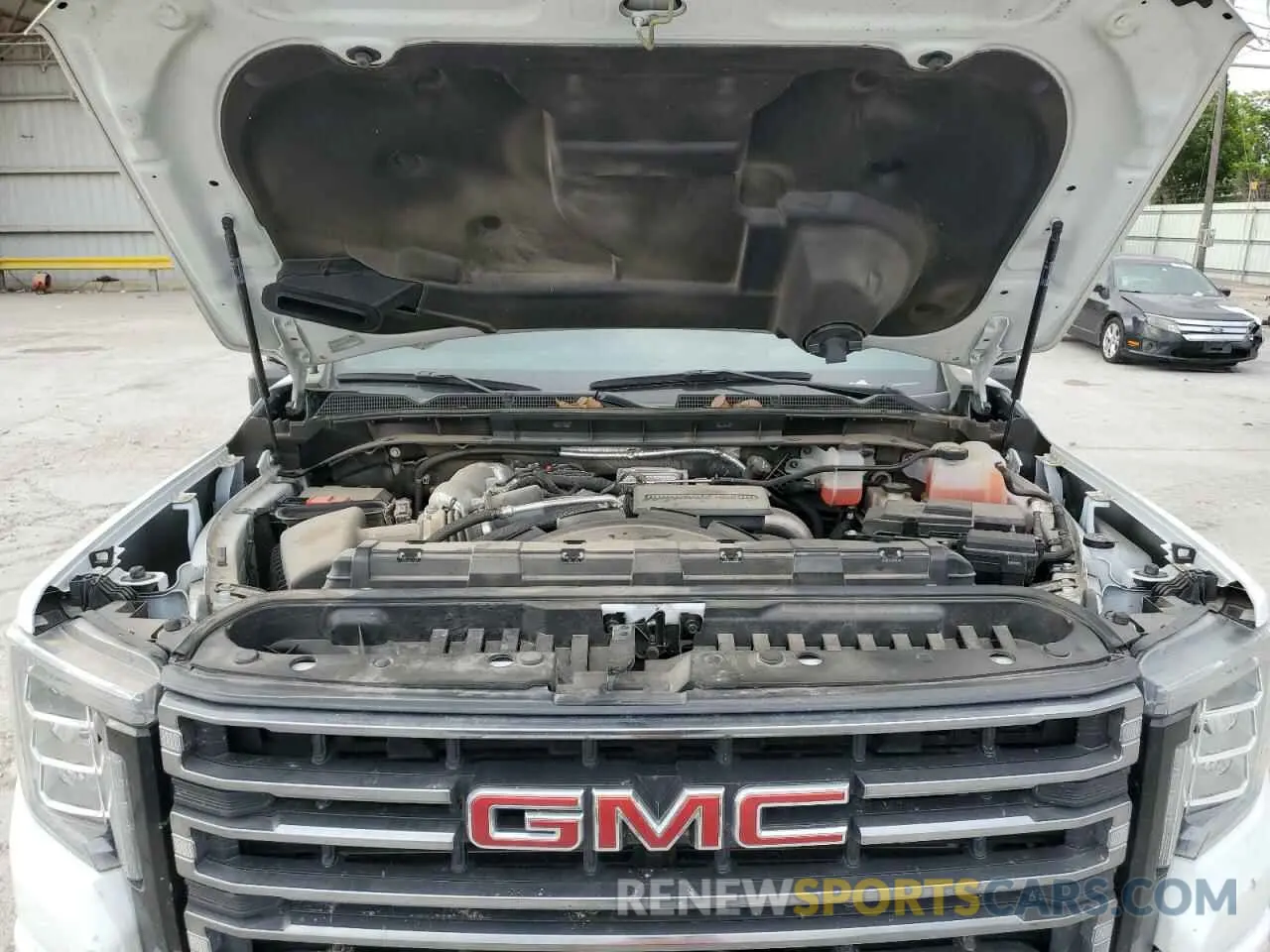 11 Photograph of a damaged car 1GT49PEY3PF161707 GMC SIERRA 2023