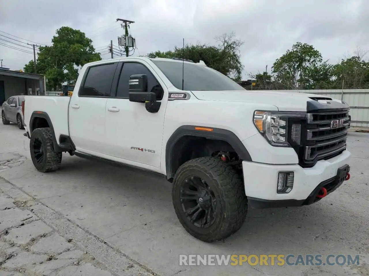 4 Photograph of a damaged car 1GT49PEY3PF161707 GMC SIERRA 2023