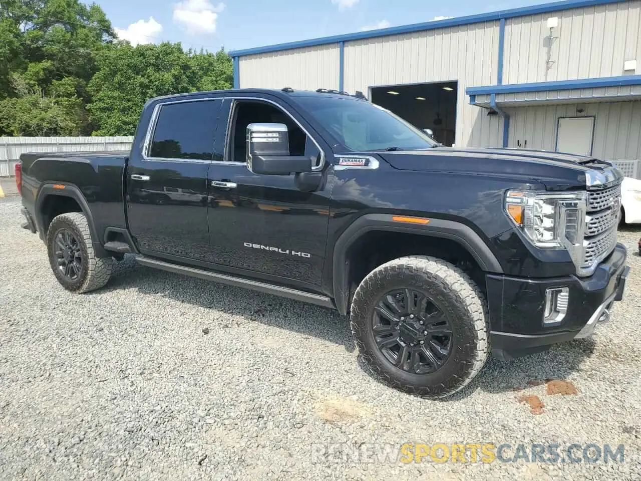 4 Photograph of a damaged car 1GT49REY3PF242556 GMC SIERRA 2023