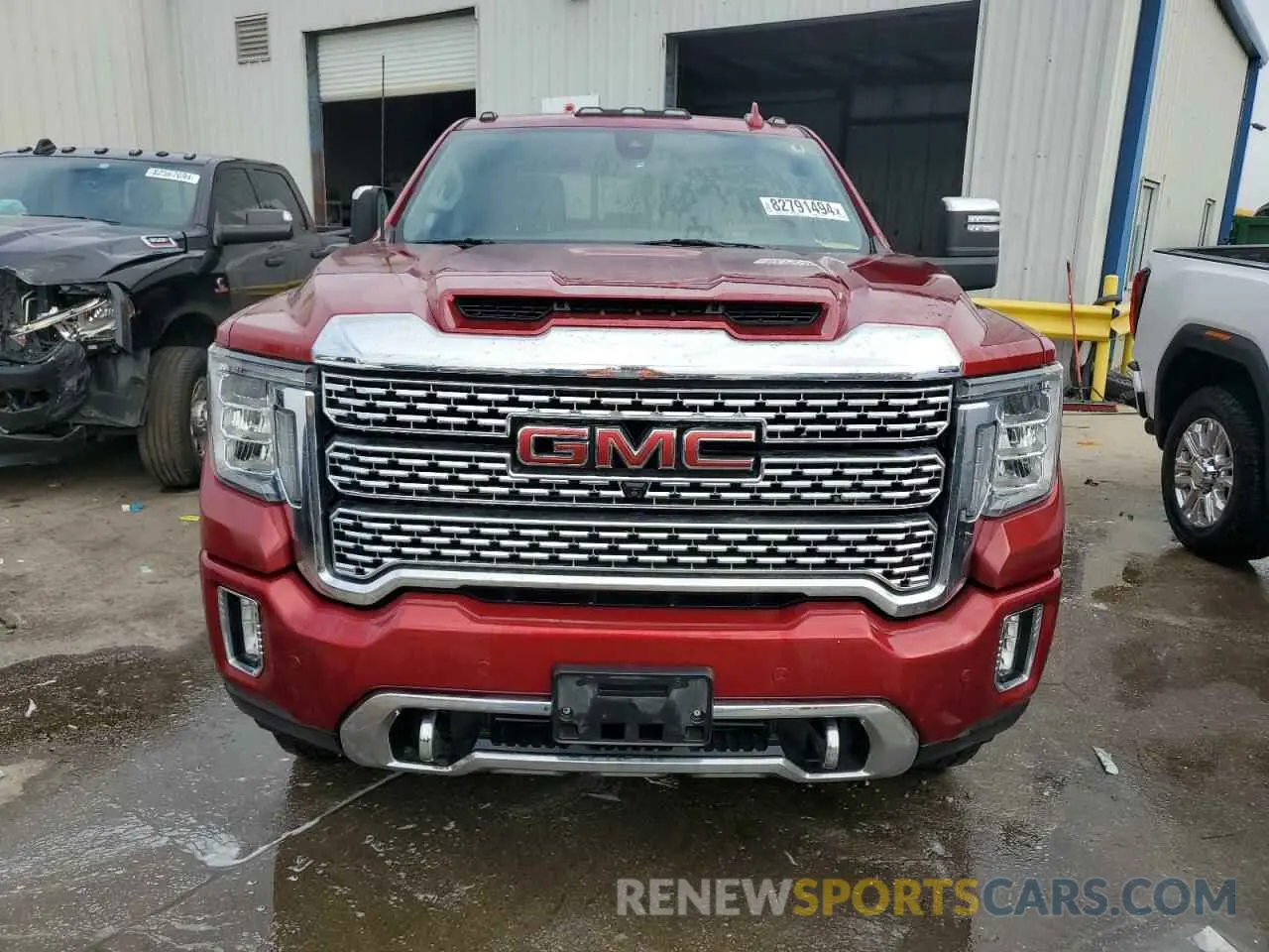 5 Photograph of a damaged car 1GT49REY4PF109482 GMC SIERRA 2023