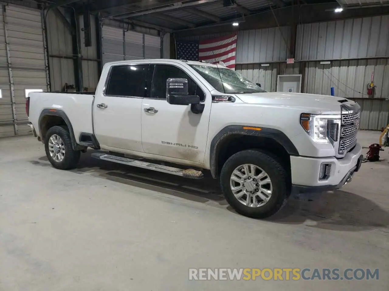 4 Photograph of a damaged car 1GT49REY4PF261097 GMC SIERRA 2023