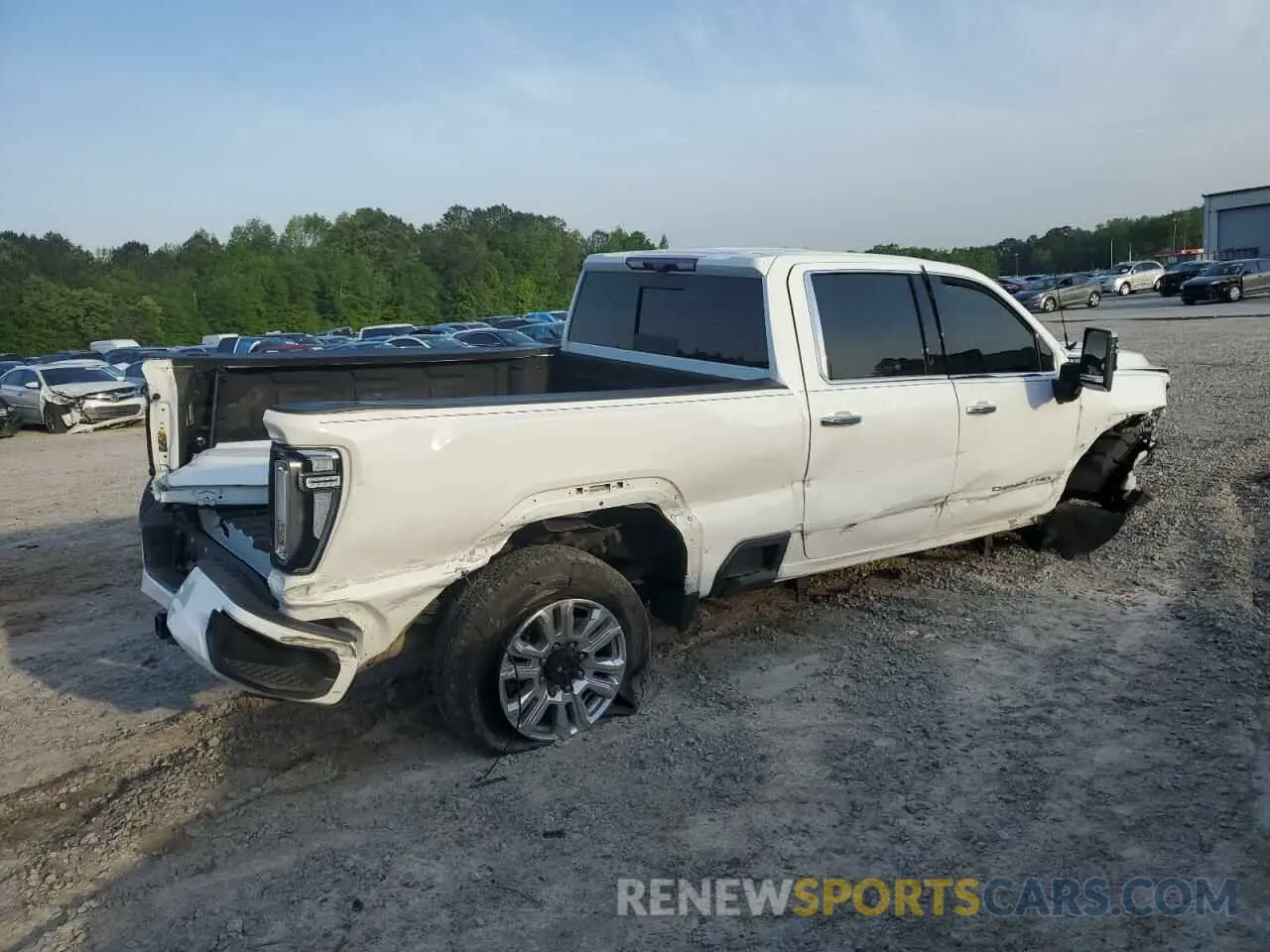 3 Photograph of a damaged car 1GT49REY6PF107412 GMC SIERRA 2023