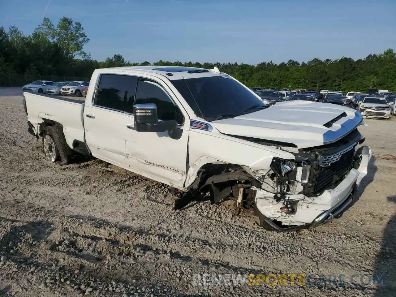 4 Photograph of a damaged car 1GT49REY6PF107412 GMC SIERRA 2023