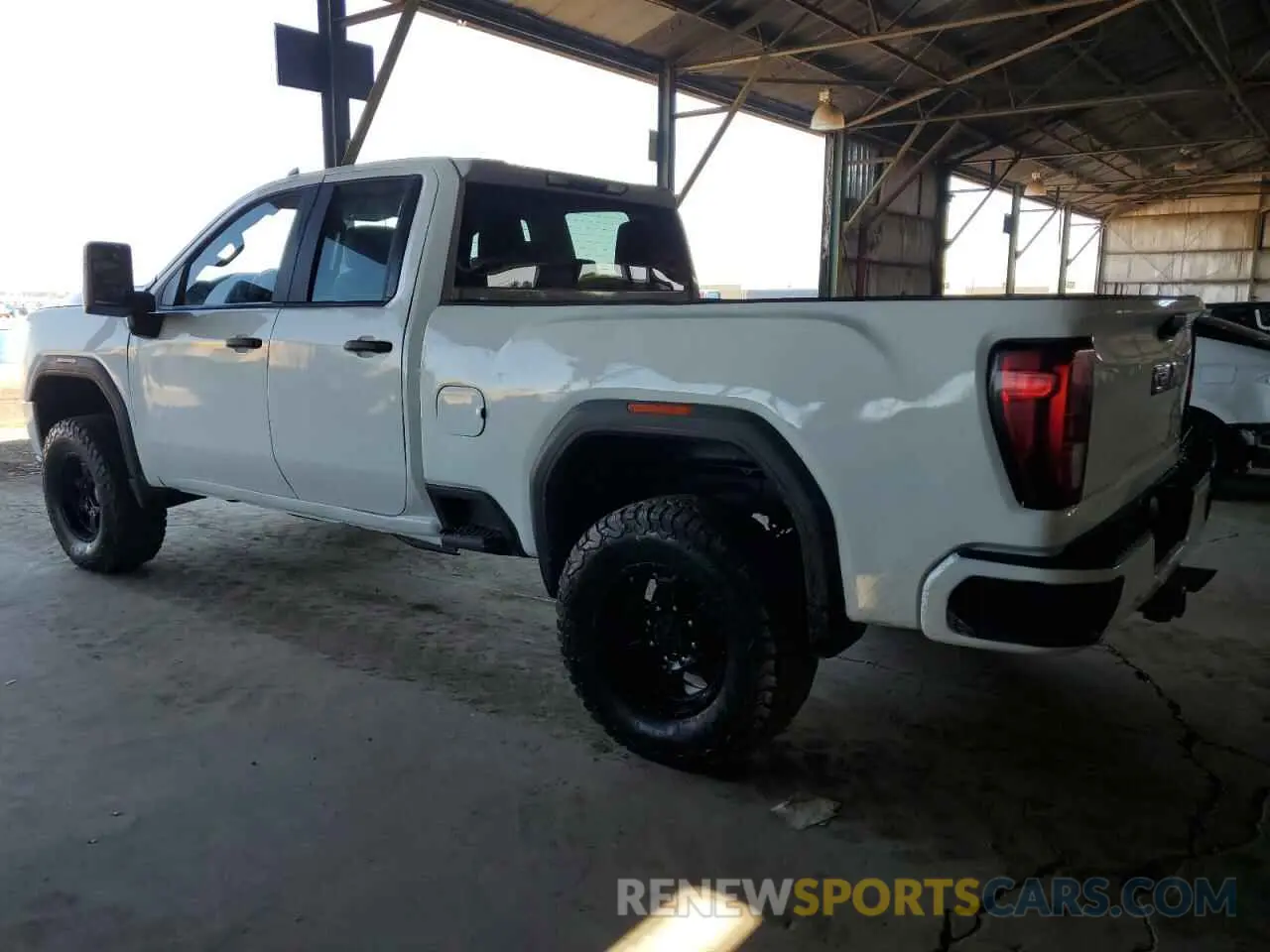 2 Photograph of a damaged car 1GT59LE7XPF221065 GMC SIERRA 2023