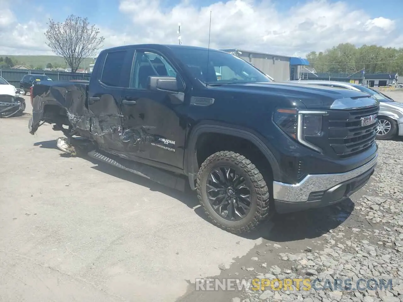 4 Photograph of a damaged car 1GTRUAED0PZ257047 GMC SIERRA 2023