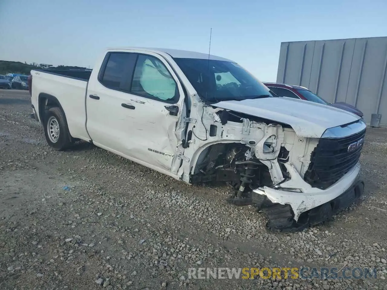 4 Photograph of a damaged car 1GTRUAED4PZ311238 GMC SIERRA 2023