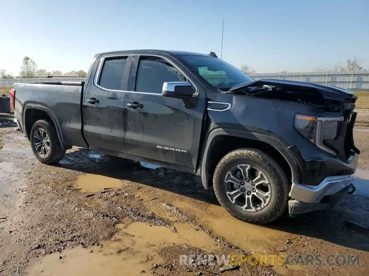 4 Photograph of a damaged car 1GTRUBEK1PZ273147 GMC SIERRA 2023