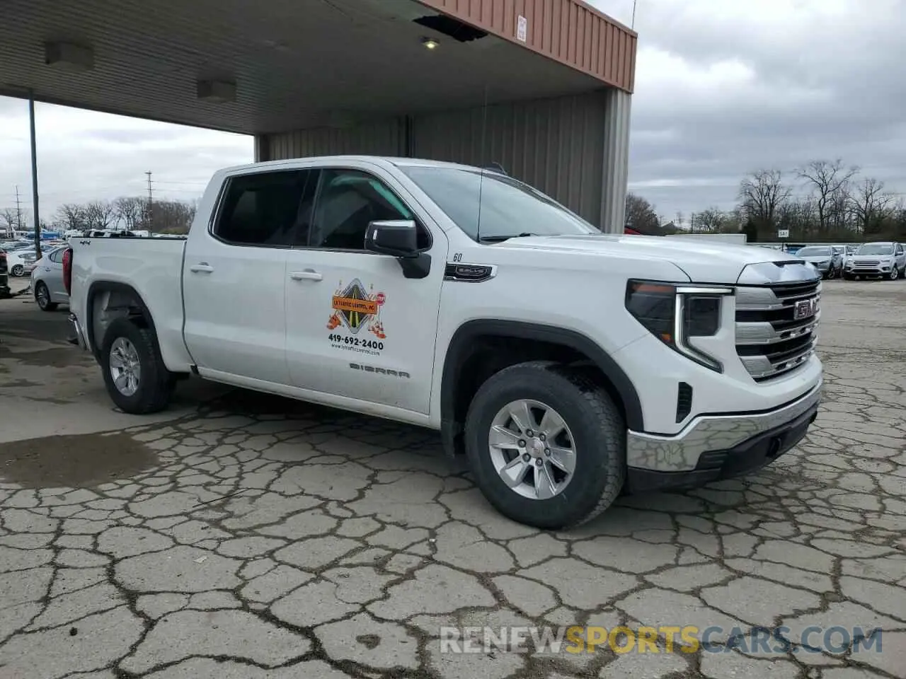 4 Photograph of a damaged car 1GTUUBED1PZ303937 GMC SIERRA 2023