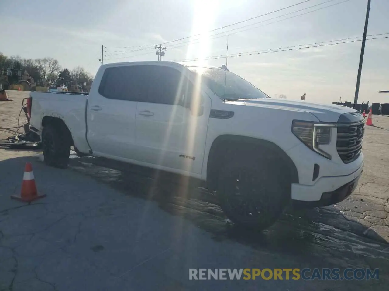 4 Photograph of a damaged car 1GTUUEELXPZ250339 GMC SIERRA 2023