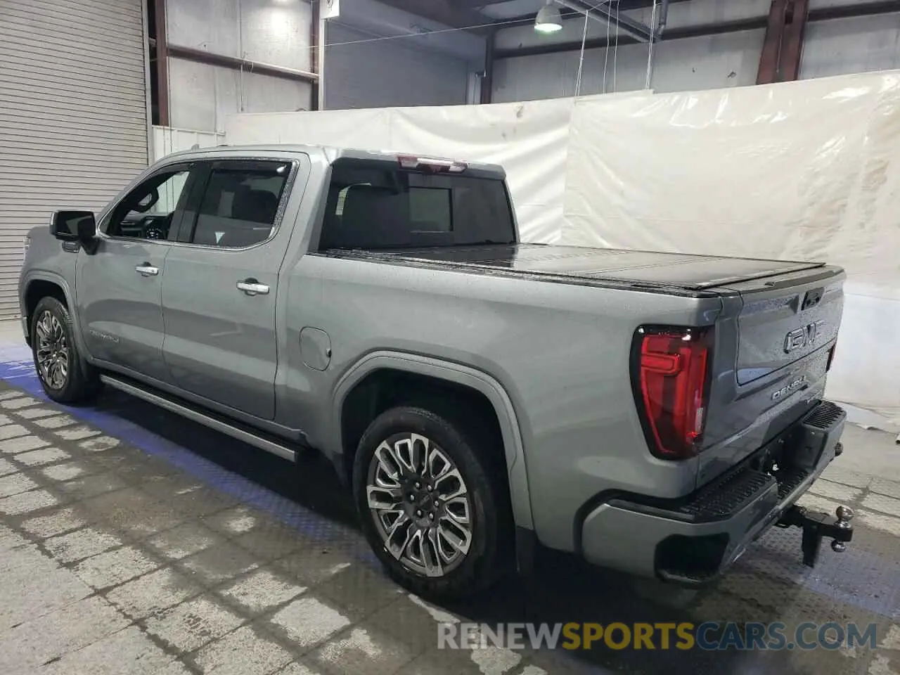 2 Photograph of a damaged car 1GTUUHE81PZ308237 GMC SIERRA 2023