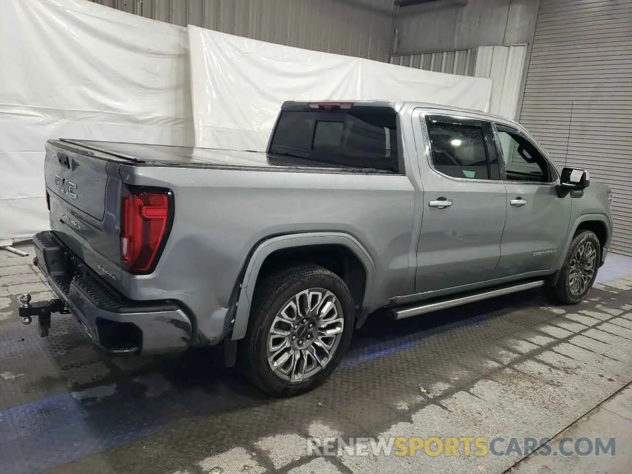 3 Photograph of a damaged car 1GTUUHE81PZ308237 GMC SIERRA 2023