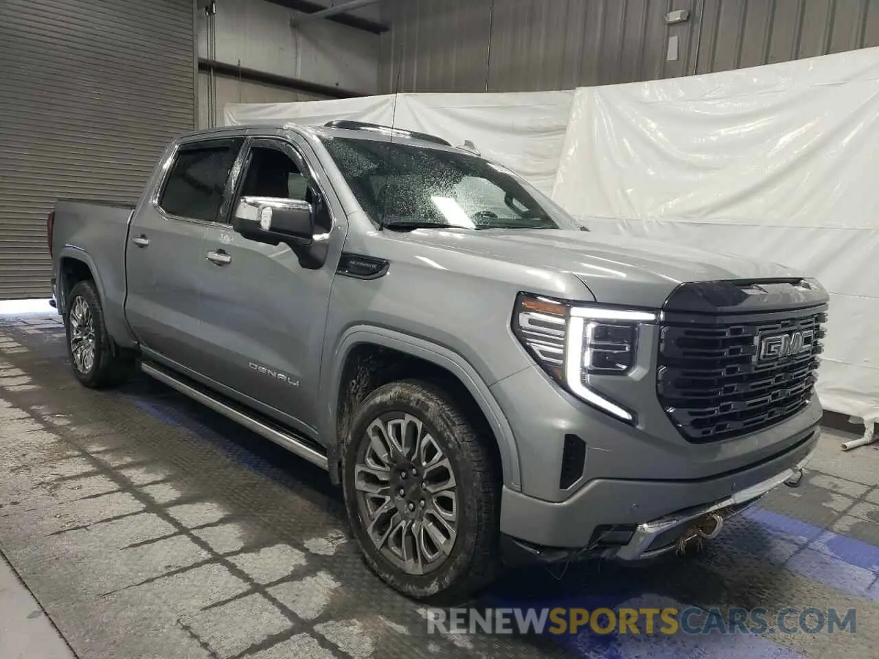 4 Photograph of a damaged car 1GTUUHE81PZ308237 GMC SIERRA 2023
