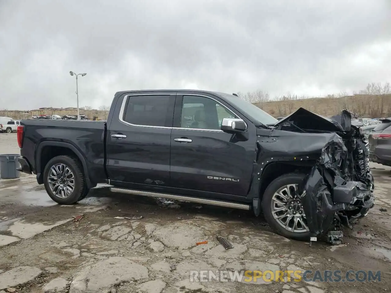 4 Photograph of a damaged car 1GTUUHEL3PZ281854 GMC SIERRA 2023