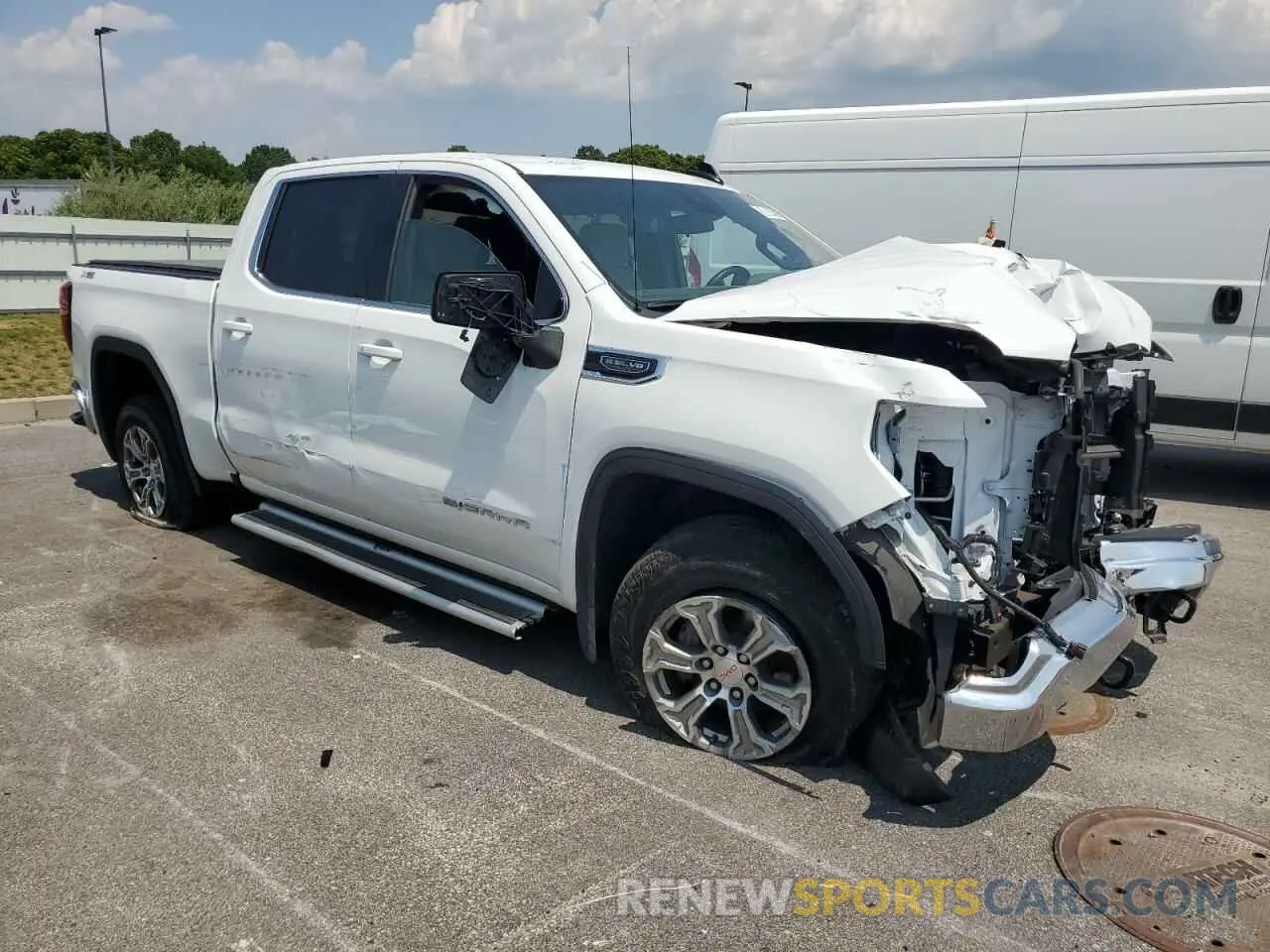 4 Photograph of a damaged car 3GTUUBED0PG276472 GMC SIERRA 2023