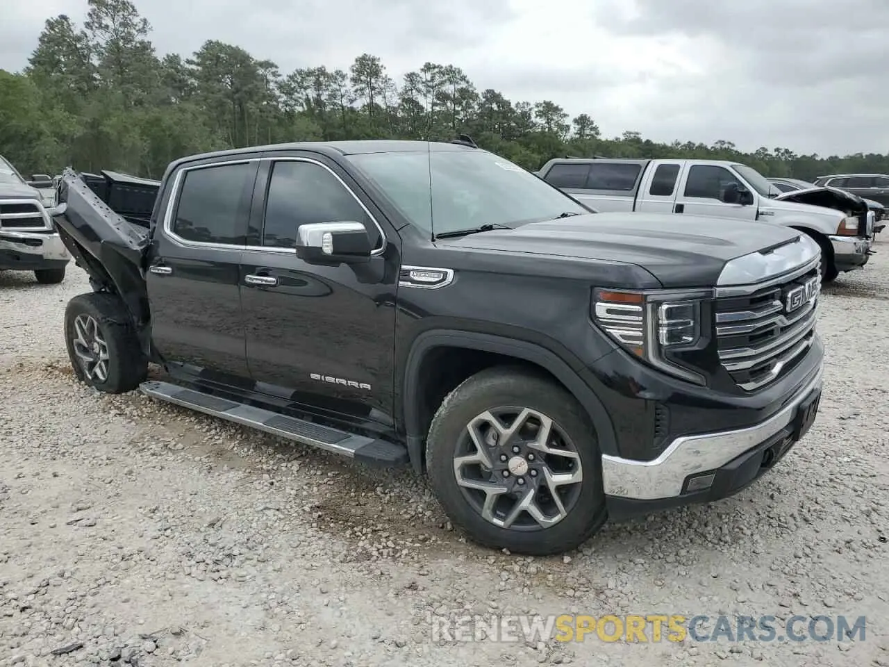 4 Photograph of a damaged car 3GTUUDED3PG136430 GMC SIERRA 2023