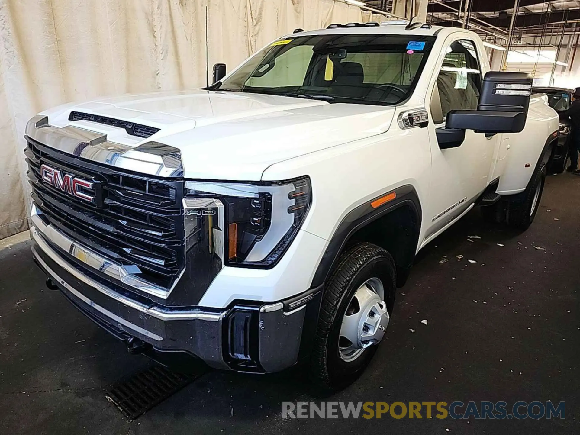 11 Photograph of a damaged car 1GT38PE79RF292195 GMC SIERRA 2024