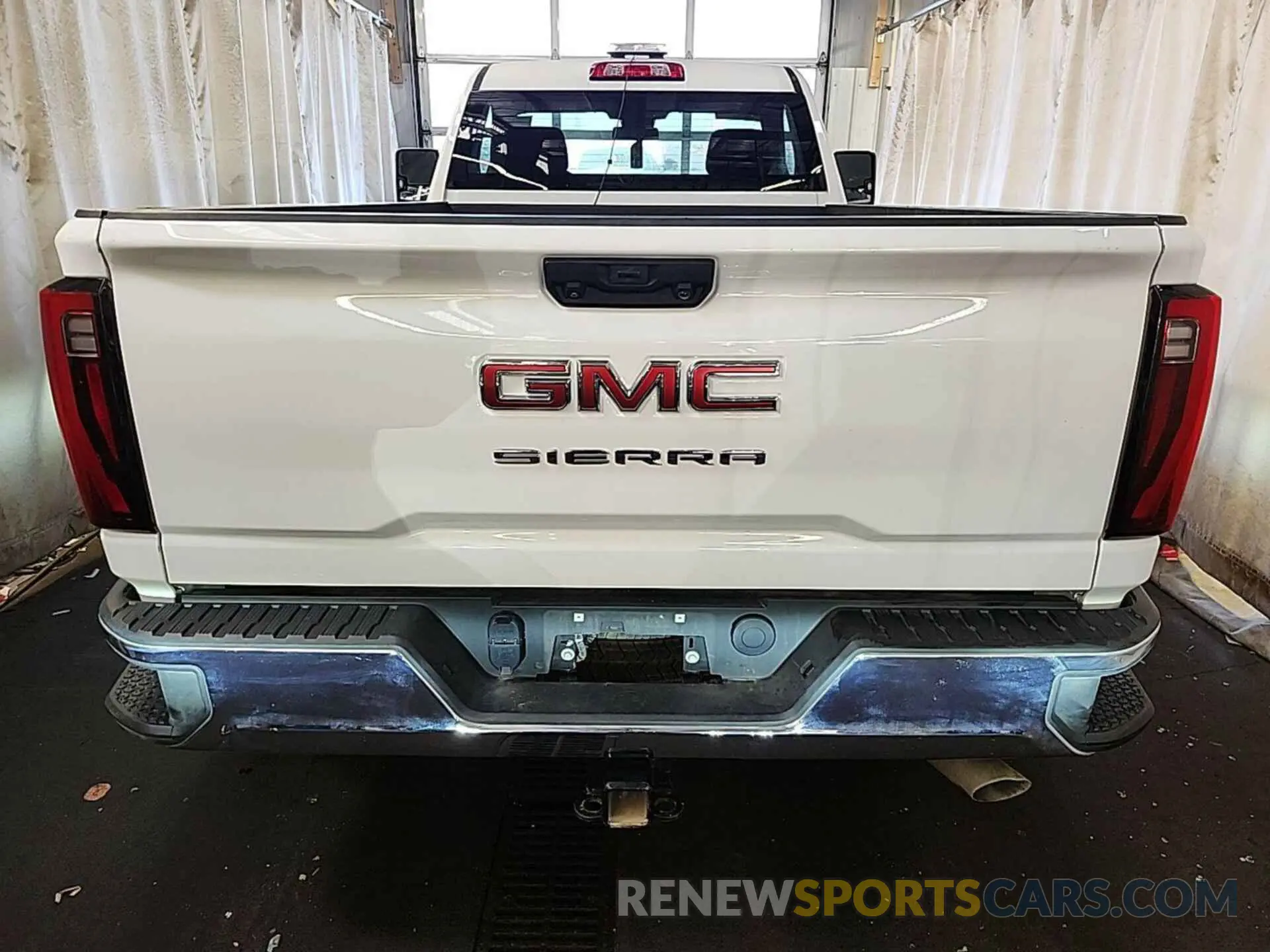 26 Photograph of a damaged car 1GT38PE79RF292195 GMC SIERRA 2024