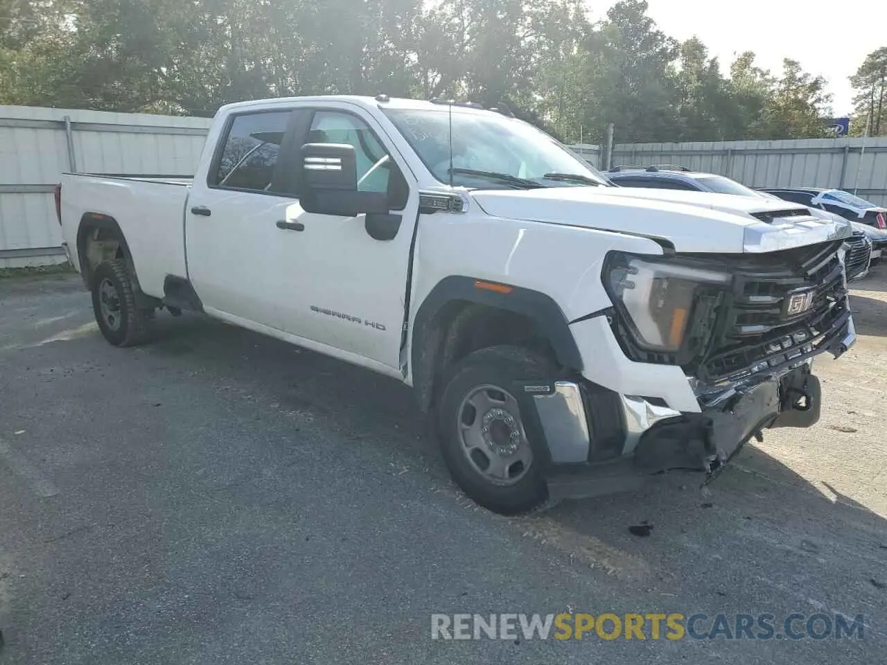4 Photograph of a damaged car 1GT48LE73RF111332 GMC SIERRA 2024