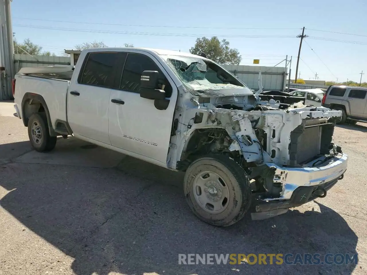4 Photograph of a damaged car 1GT49LE72RF159367 GMC SIERRA 2024