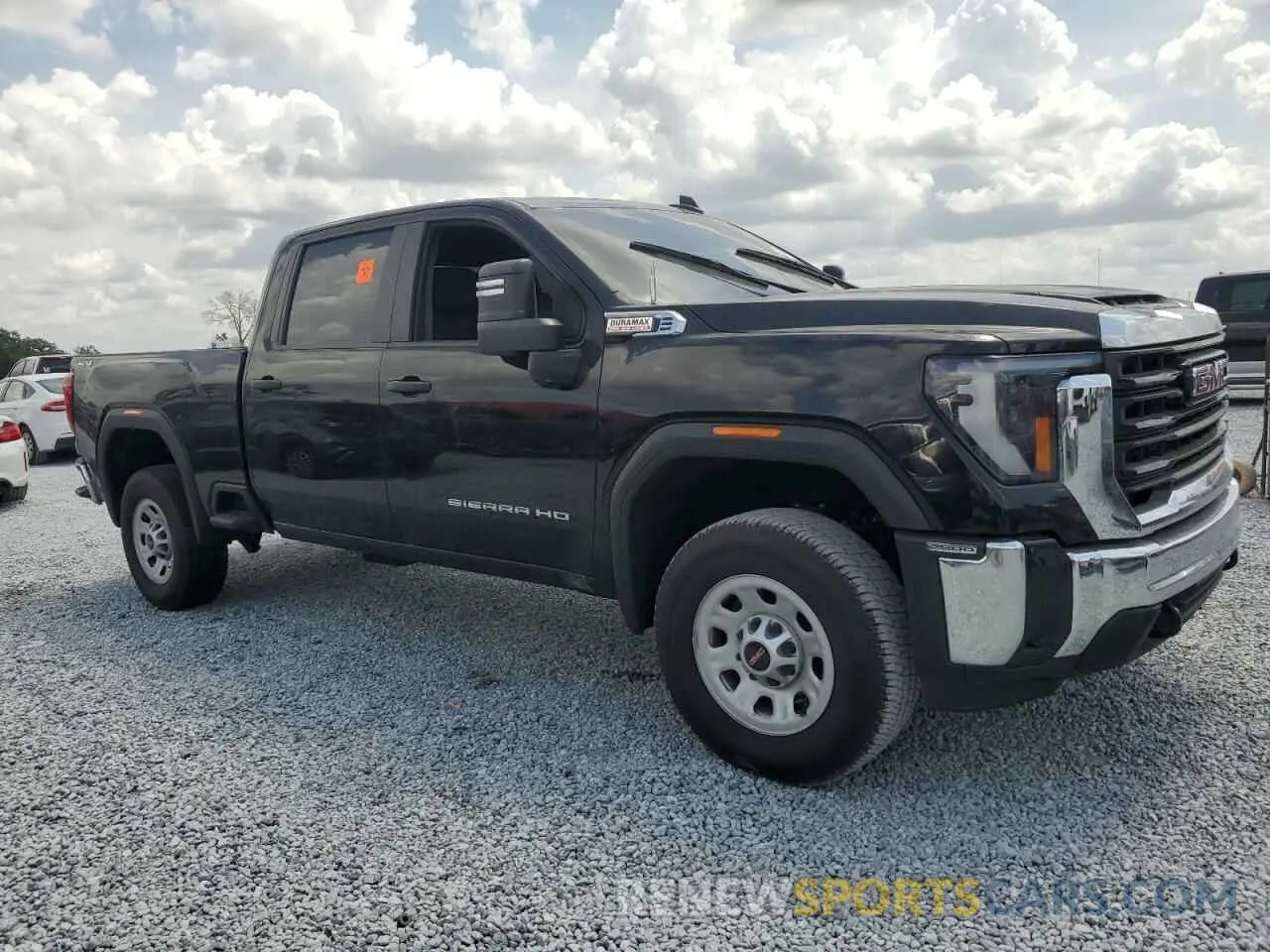 4 Photograph of a damaged car 1GT49LEY8RF457110 GMC SIERRA 2024