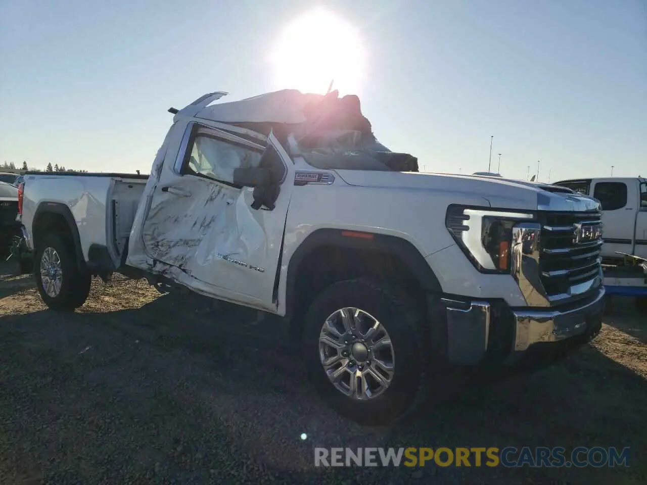 4 Photograph of a damaged car 1GT49MEY9RF152754 GMC SIERRA 2024