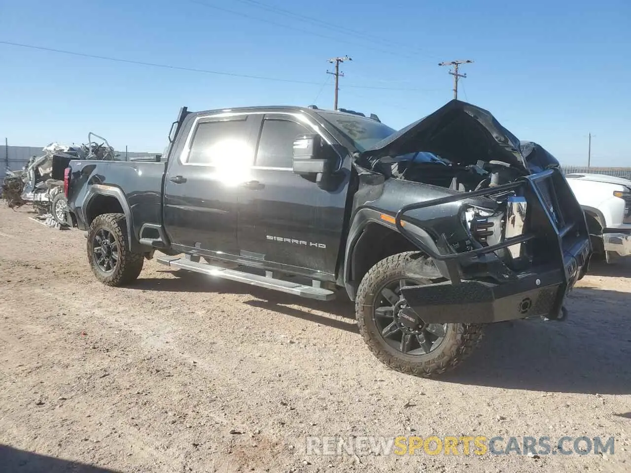 4 Photograph of a damaged car 1GT49NE76RF173560 GMC SIERRA 2024