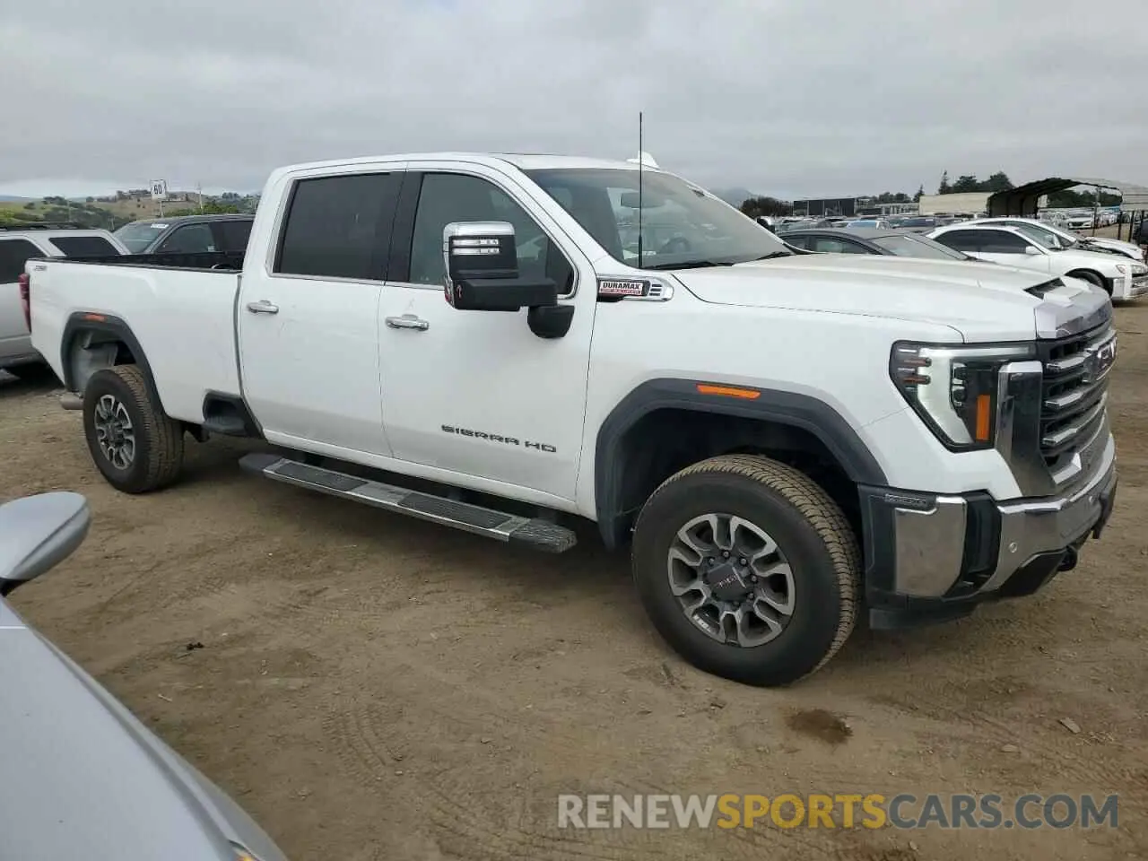 4 Photograph of a damaged car 1GT49NEY8RF290923 GMC SIERRA 2024