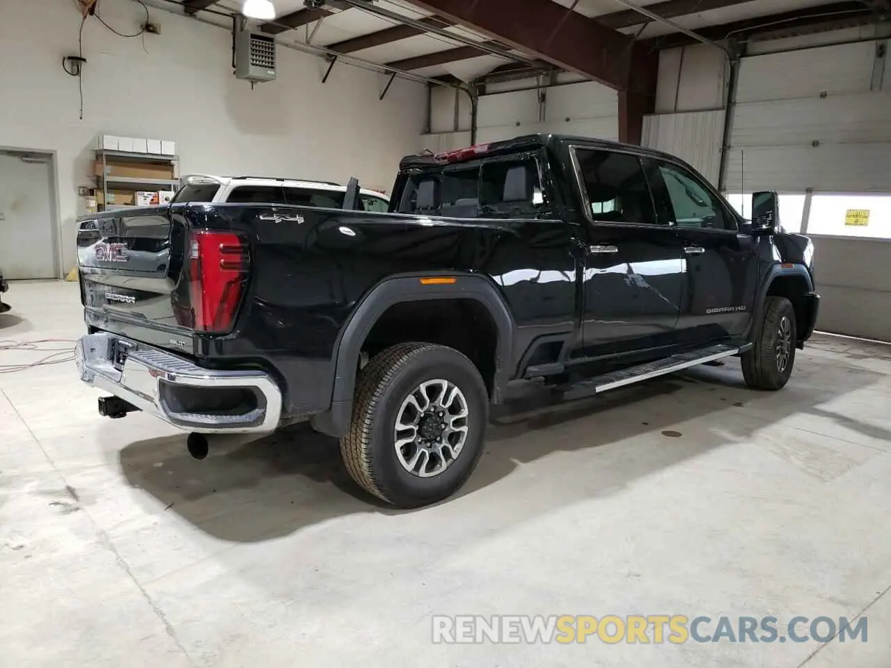 3 Photograph of a damaged car 1GT49NEY8RF446491 GMC SIERRA 2024