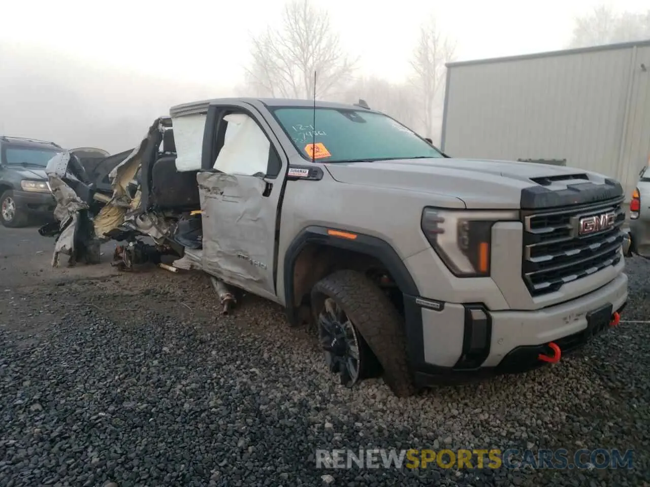 4 Photograph of a damaged car 1GT49PEY9RF377385 GMC SIERRA 2024
