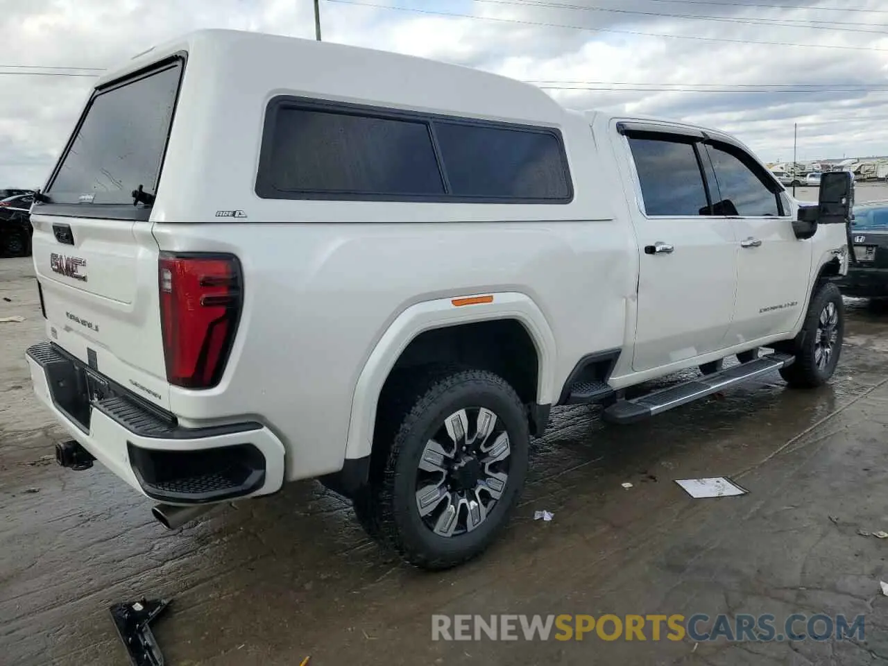 3 Photograph of a damaged car 1GT49RE74RF395604 GMC SIERRA 2024
