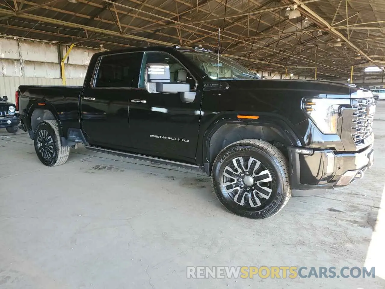 4 Photograph of a damaged car 1GT49XEY2RF126272 GMC SIERRA 2024